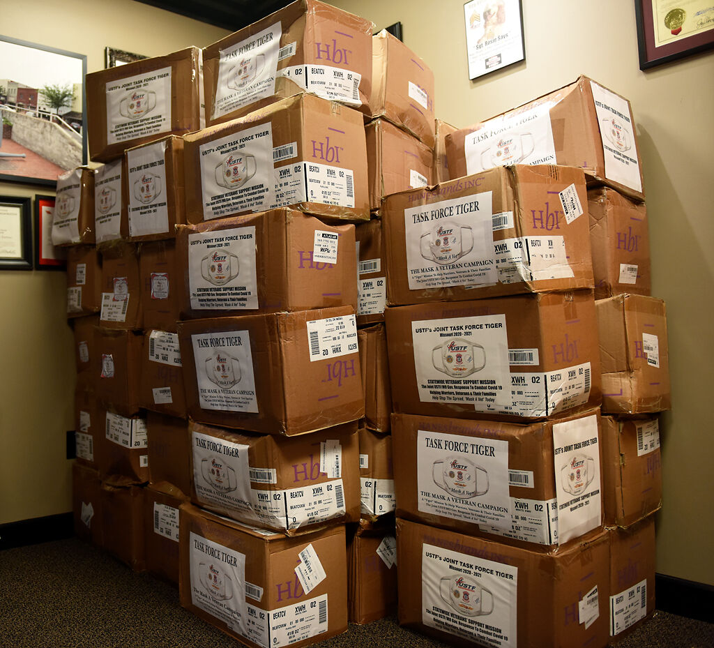 Thousands of masks lie ready for distribution